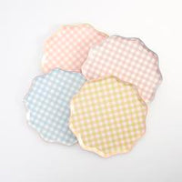gingham print paper party plates in a pack of twelve plates in four colors, blue, coral , pink and yellow. Eight inches diameter perfect for appetizers and desserts