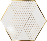 white plates with metallic gold stripes and trim on a hexagon shaped plate