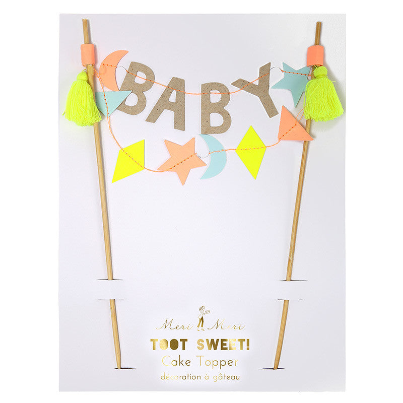 Baby cake topper to welcome your new arrival. Stars and shapes in bright colors. Made by Toot Sweet