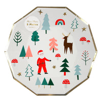 Holiday paper party plates, white with a whimsical print of holiday icons including Santa, a reindeer, pine trees, a rainbow, red and white mushrooms and embellished with gold foil stars and border of plates, set of 8