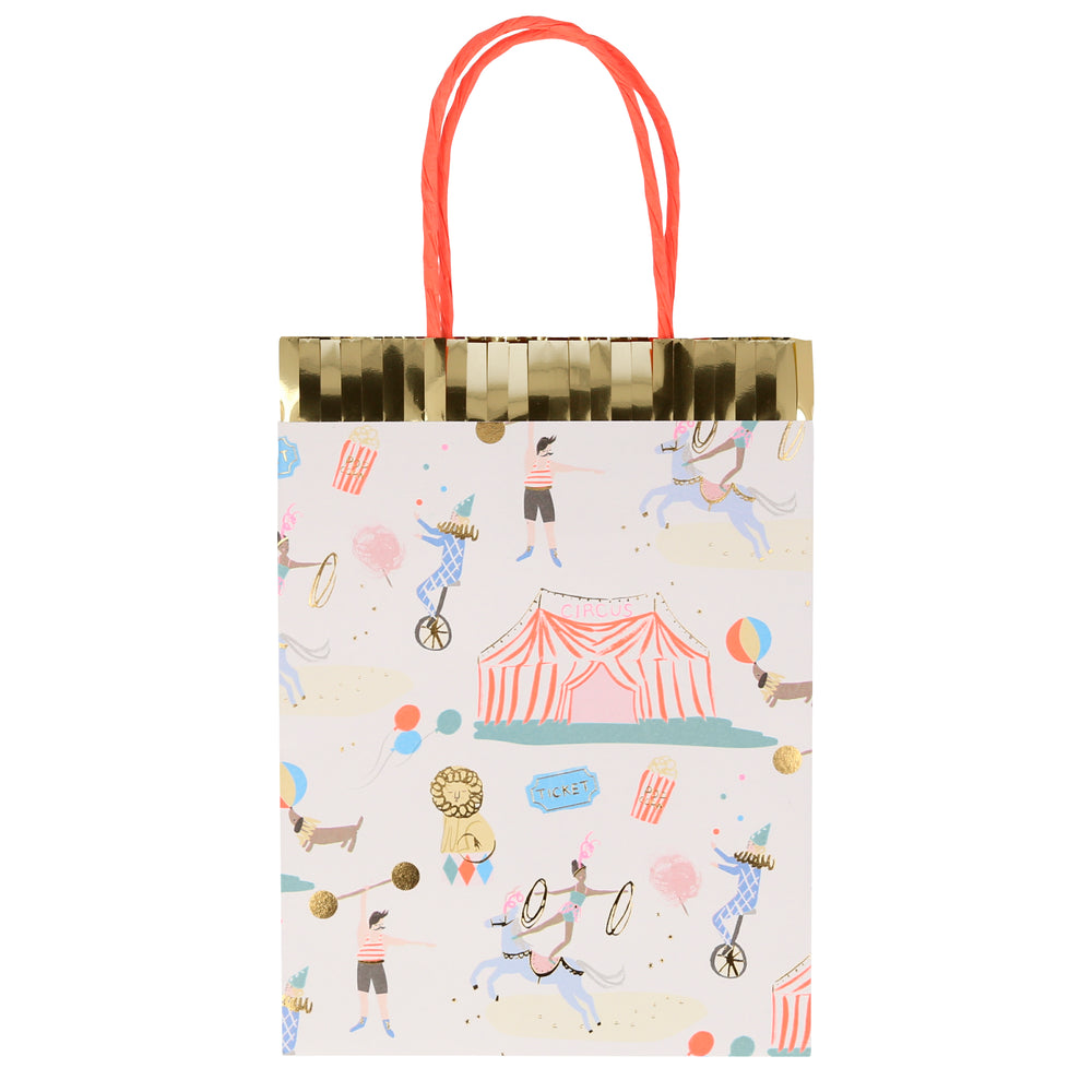 Paper party bags with a beautifully illustrated circus print theme including a big circus tent, jugglers, strongman, dog, performing pony, lion, popcorn and ticket to the circus