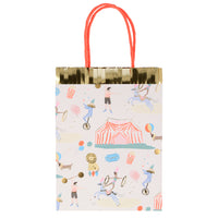 Paper party bags with a beautifully illustrated circus print theme including a big circus tent, jugglers, strongman, dog, performing pony, lion, popcorn and ticket to the circus