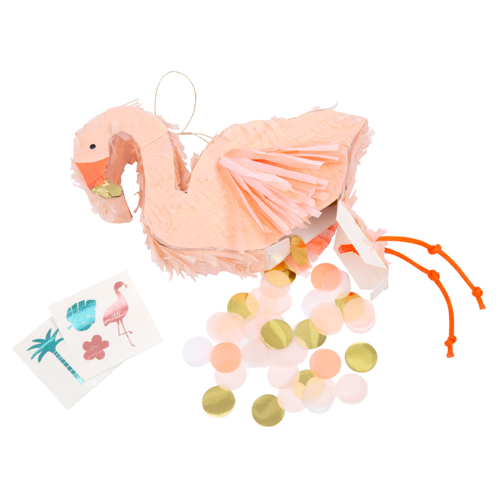 Flamingo pinata party favor in a soft coral color  with dark coral beak, wings and  knotted cord dangly legs, this flamingo is pre-filled with two temporary tattoos and confetti