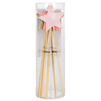 glitter star wands in a set of eight in three colors packaged in a clear plastic tube. These wands are perfect for princess and fairy themed parties.