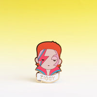 David Bowie better known as " Ziggy " enamel brooch is a colorful accessory perfect for a gift or party favor