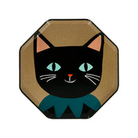 Vintage illustration of a black cat with bright mint green eyes and printed on an octagonal shaped plate.