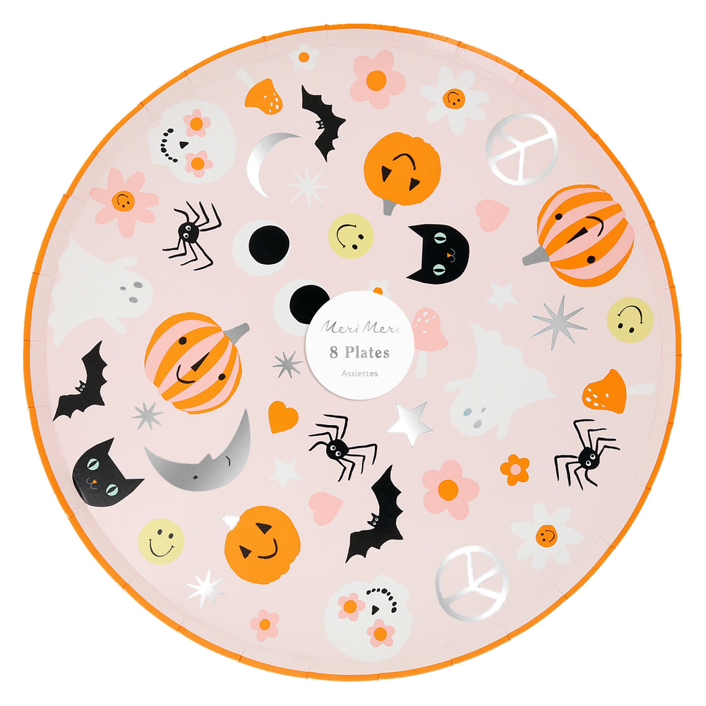 Pack of eight paper party plates, round soft pink with bright orange rim and cool Halloween icons including cat, bat, moon, happy face, spiders, mushrooms, ghost, flower power flowers.