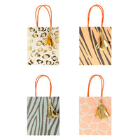 Paper party and treat bags in four prints, cheetah, tiger, zebra and giraffe prints, each with a gold Mylar tassel, braided handle.