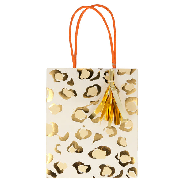 Paper party bag with a cheetah print with shiny gold foil details and a gold mylar tassel. Pack of 8 bags