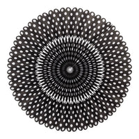 Seventeen inch diameter black paper party fan printed with white polkadots and a scalloped edge. 