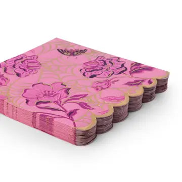 Stack of pink and purple floral print paper party napkins. Part of the Vamp Romantic paper party goods collection