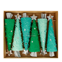 These Christmas Tree shaped crackers are a colorful twist on tradition. Made from green fringed crepe paper, with shimmering silver foil details. Each one contains a gorgeous glitter star brooch, a hat and a joke.  Suitable for ages 8+  Pack of 6 in 3 shades of green  Product dimensions: 2.5 by 9 by 2.5 inches