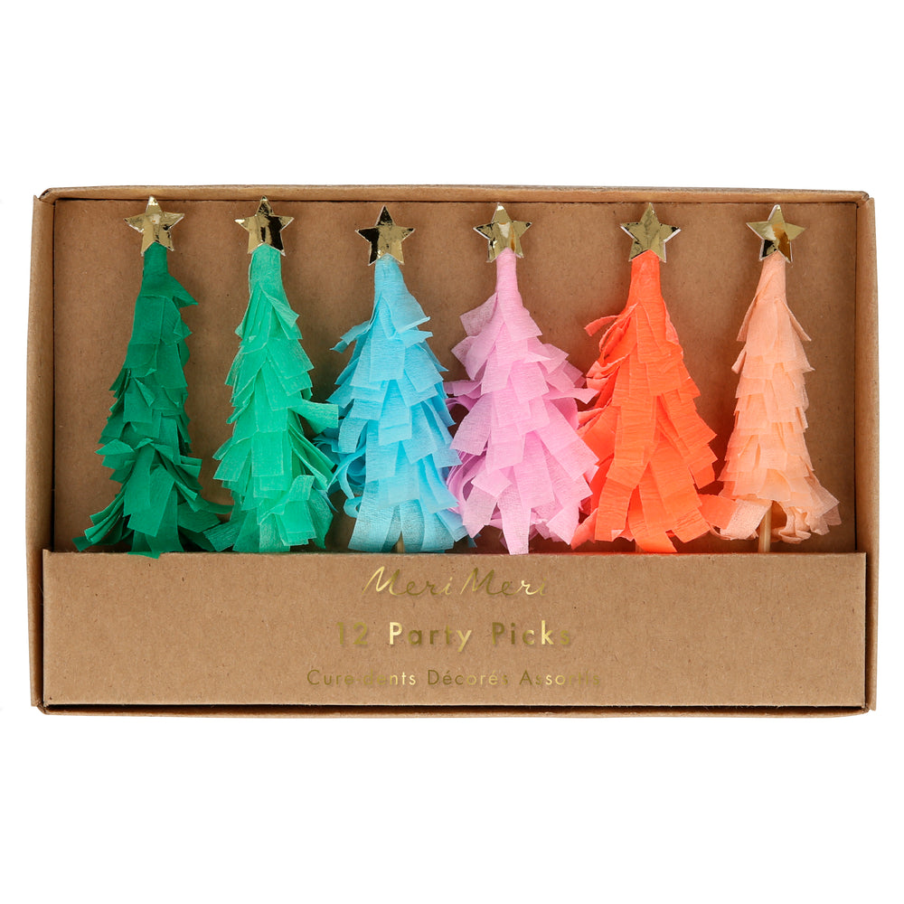 These clever Rainbow Fringed Tree Picks are colorfully delightful as part of your party table. There are 12 picks in six colors, teal, green, blue, neon coral, dusty pink and peach pink.  Made from fringed crepe paper and feature a gold star on top.  They have wooden cocktail sticks. Packaging made using eco-friendly paper  Product dimensions: 0.75 by 3.5 by 0.75 inches