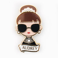 Audrey Hepburn enamel pin designed by artist Becky Kemp.Made of high quality gilt metal and hard enamel