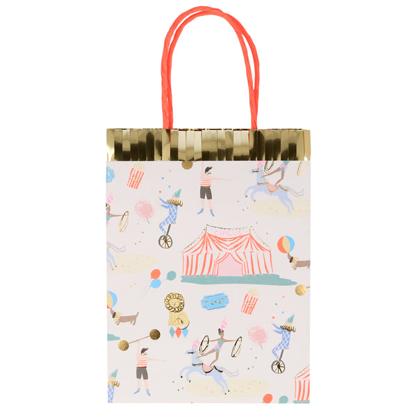 Paper party bags with a beautifully illustrated circus print theme including a big circus tent, jugglers, strongman, dog, performing pony, lion, popcorn and ticket to the circus 