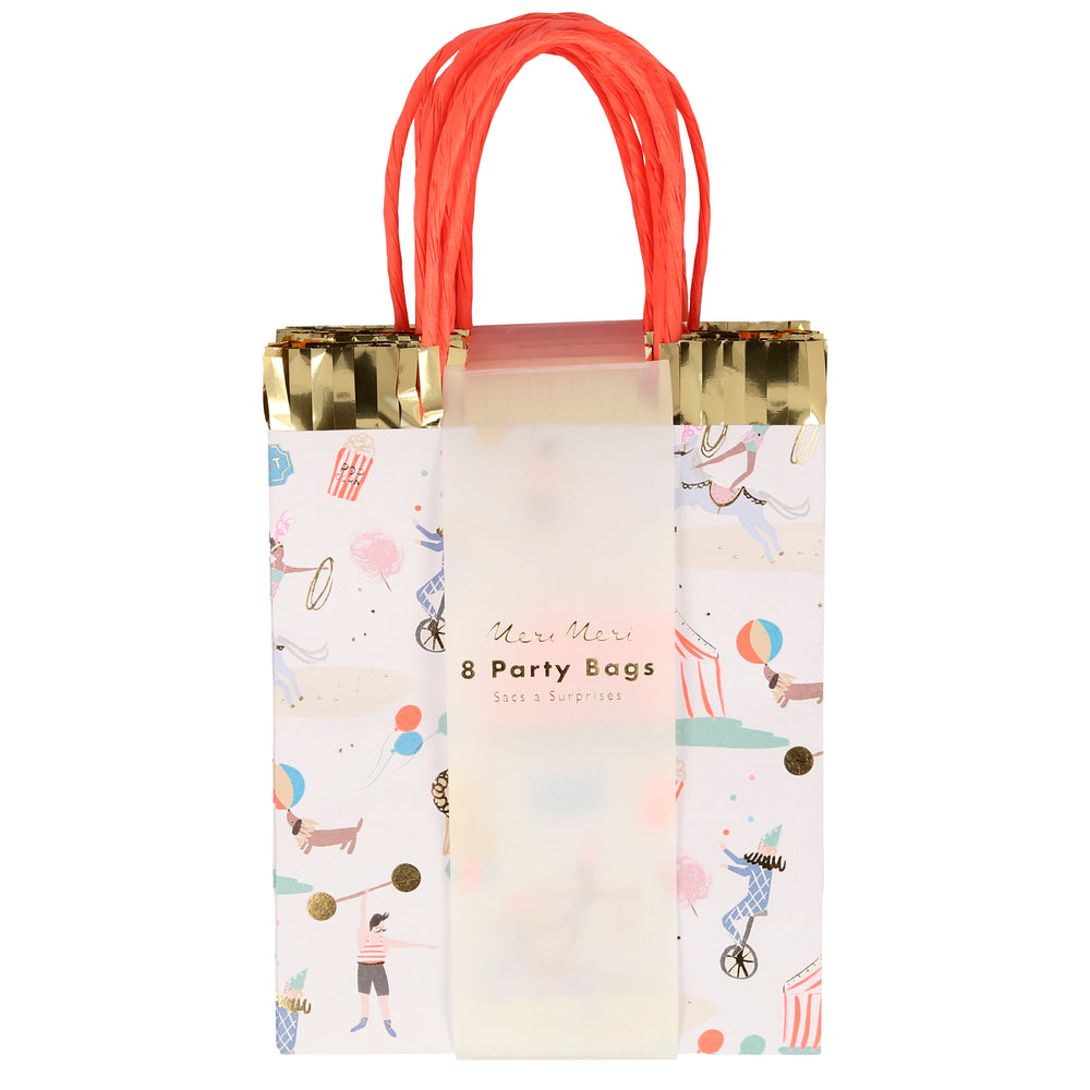pack of eight paper party bags with a beautifully illustrated circus print theme including a big circus tent, jugglers, strongman, dog, performing pony, lion, popcorn and ticket to the circus