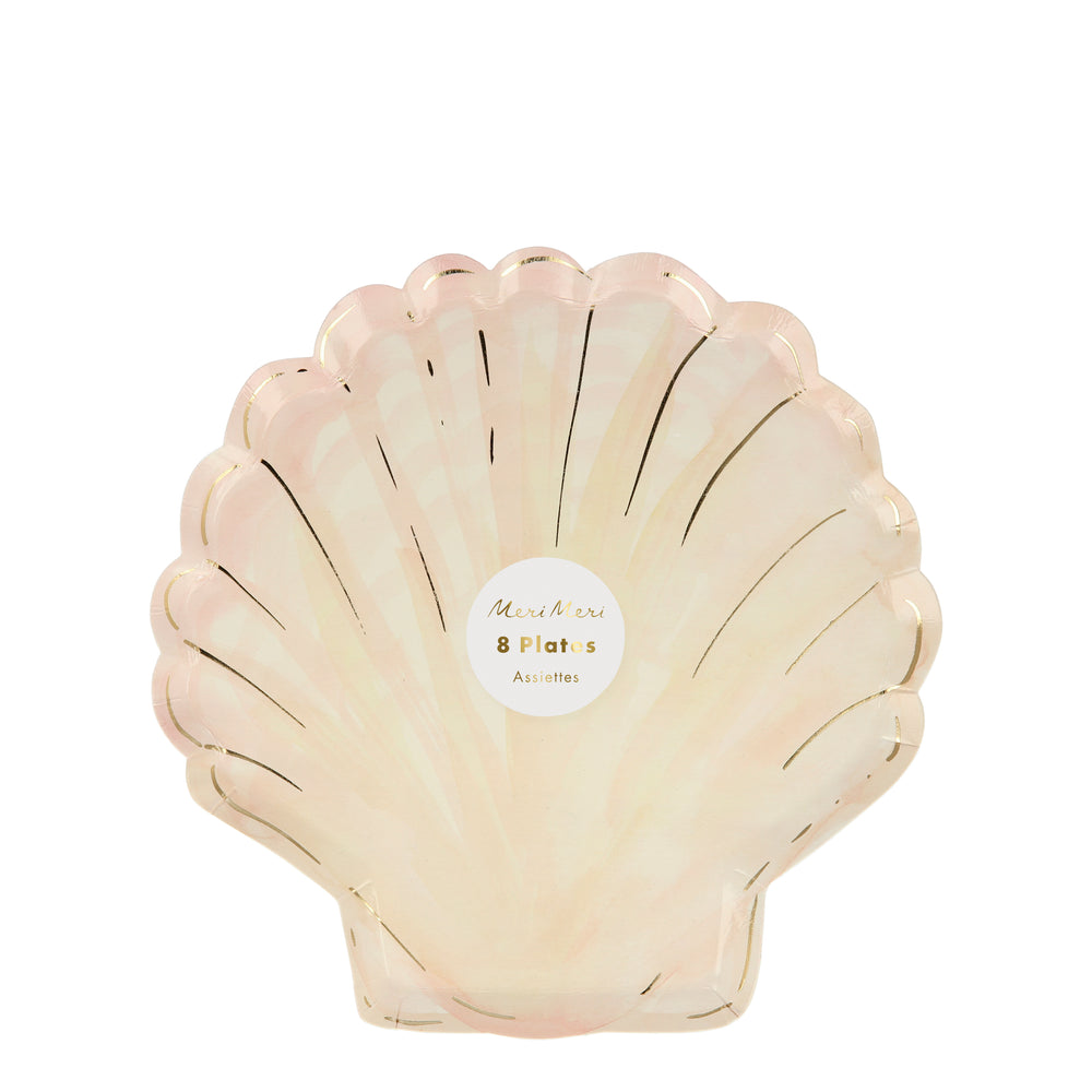 die-cut in the shape of a clam shell with soft watercolor brush strokes in soft shades of natural peach colors and highlighted with shiny gold details, perfect for beach , under-the-sea and mermaid themed parties. Eight paper party plates per package