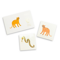 safari animal themed temporary tattoos includes one tiger and one shiny gold snake