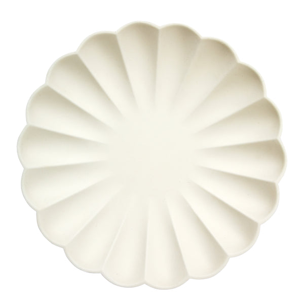 These beautiful cream eco plates are made from all natural materials - pulp from bamboo, wood fiber and sugarcane and colored using soy ink dyes. They are molded into an elegant 3D curved shape, with a scalloped edge
