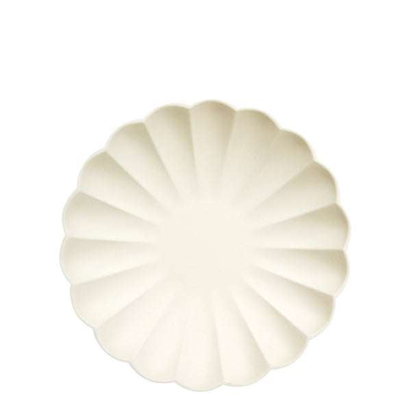 cream eco plates are made from all natural materials - pulp from bamboo, wood fiber and sugarcane and colored using water-based ink dyes. They are molded into an elegant curved shape, with a scalloped edge.