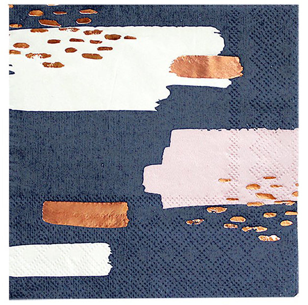 navy blue paper cocktail napkins with white and pale peach brush strokes and enhanced with rose gold foil details.