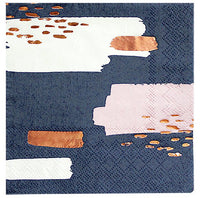 navy blue paper cocktail napkins with white and pale peach brush strokes and enhanced with rose gold foil details.