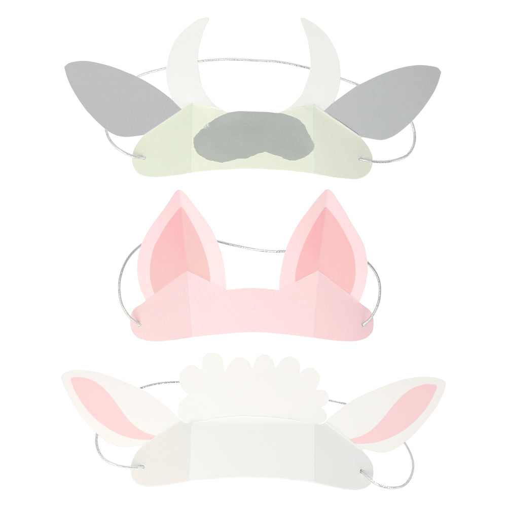 farm animal headband party ears. Set of three includes a white with grey cow, pink pig and  a sheep with white and pink ears. Made of die cut paper and silver elastic band. 