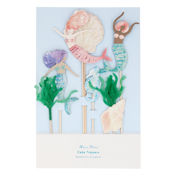 beautifully illustrated cake toppers featuring three mermaids, two seashells, a seahorse made from paper cardstock and two seaweed toppers made with green tissue paper. set of seven toppers on bamboo slender sticks