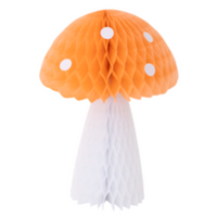 orange toadstool mushroom with white stem and polka dots. large size