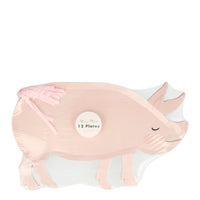 package of etwelve pink paper pig shaped plates with a rafia tail , perfect for a farm animal themed party