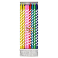 set of twenty-four tall candles in six different designs, all decorated with brilliant stripes Pack of twenty four in six colors candle height-5.75 inches