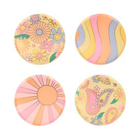 plates in four 1960's inspired groovy prints including flower power print, swirls, sunbeams and paisley print. Ten and one quarter inch diameter plate. Set of eight in four patterns. print on front, solid color printed on back of each plate.