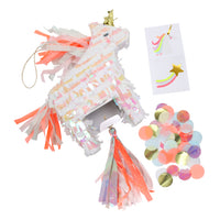 mini unicorn pinata made with iridescent paper and pre-filled with multi-colored confetti and one unicorn and one shooting star temporary tattoos and space for extra small treats