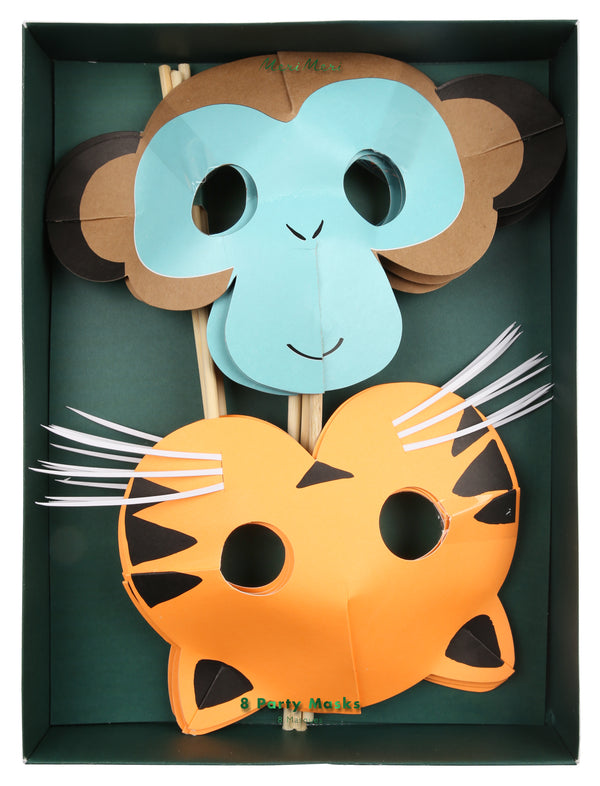 cheeky monkeys and roaring tigers paper party masks , set of eight masks for of each. Bright orange with black stripe and white whisker tigers and brown with aqua monkeys. Made of paper with a thin wood dowel to hold mask.